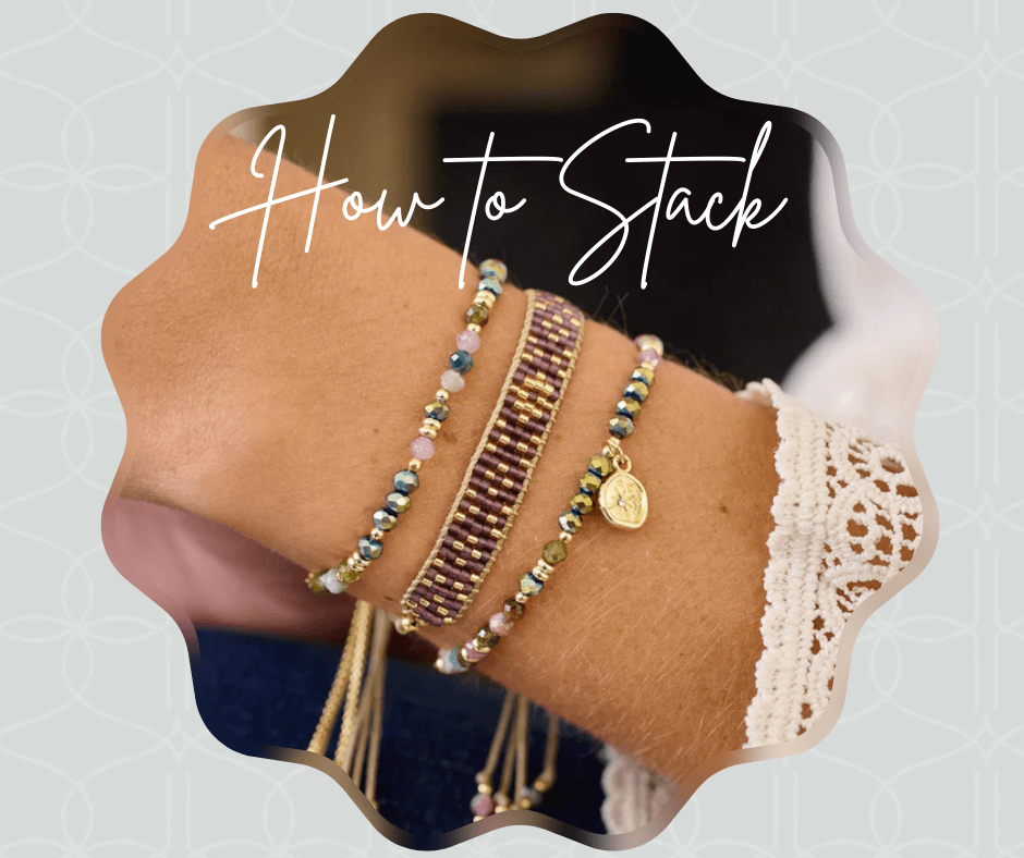 How to stack bracelets guide showing a purple woven bracelet layered with a gemstone charm bracelet and beaded bracelet, styled together for a boho luxe stacked look.