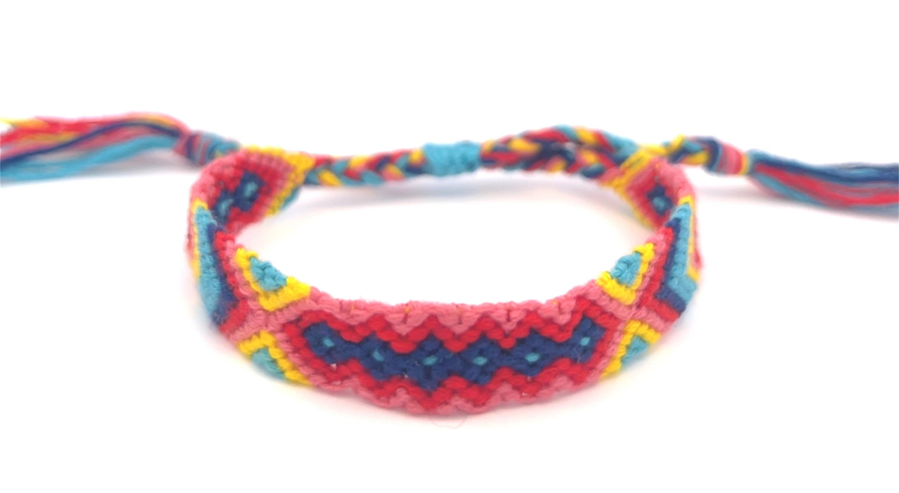 Colorful braided friendship bracelet on a white background #color_multi
