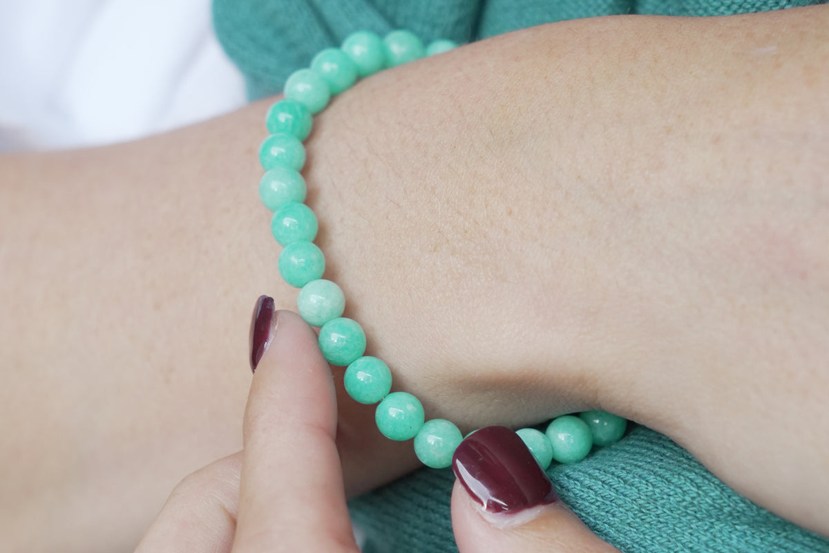 Mani amazonite gold stretch bead bracelet by Boho Betty – styled in a stack, a gold amazonite beaded stretch bracelet