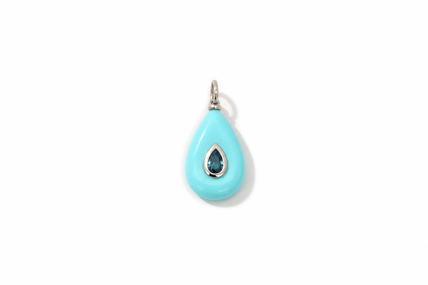 Fleur Turquoise Charm Silver featuring a carved turquoise-coloured gemstone with a blue crystal on a waterproof rhodium-plated stainless steel loop.