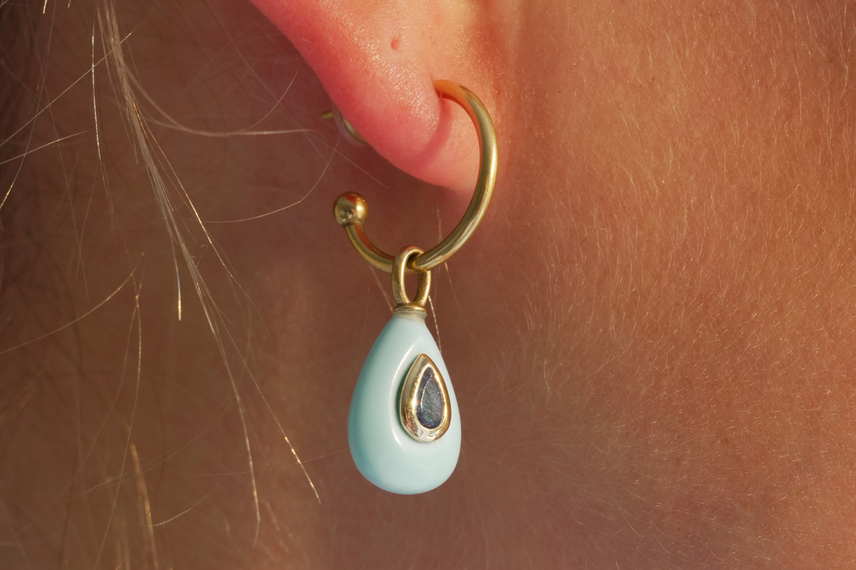 Hana Turquoise Gold Hoop Earrings worn with turquoise-coloured gemstone drops and waterproof 14k gold PVD hoops for effortless holiday styling.
