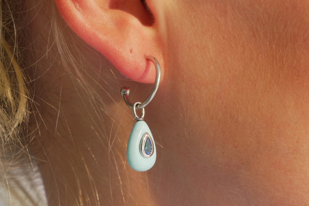 Hana Turquoise Silver Hoop Earrings worn with turquoise-coloured gemstone drops and rhodium-plated stainless steel hoops for effortless holiday styling.