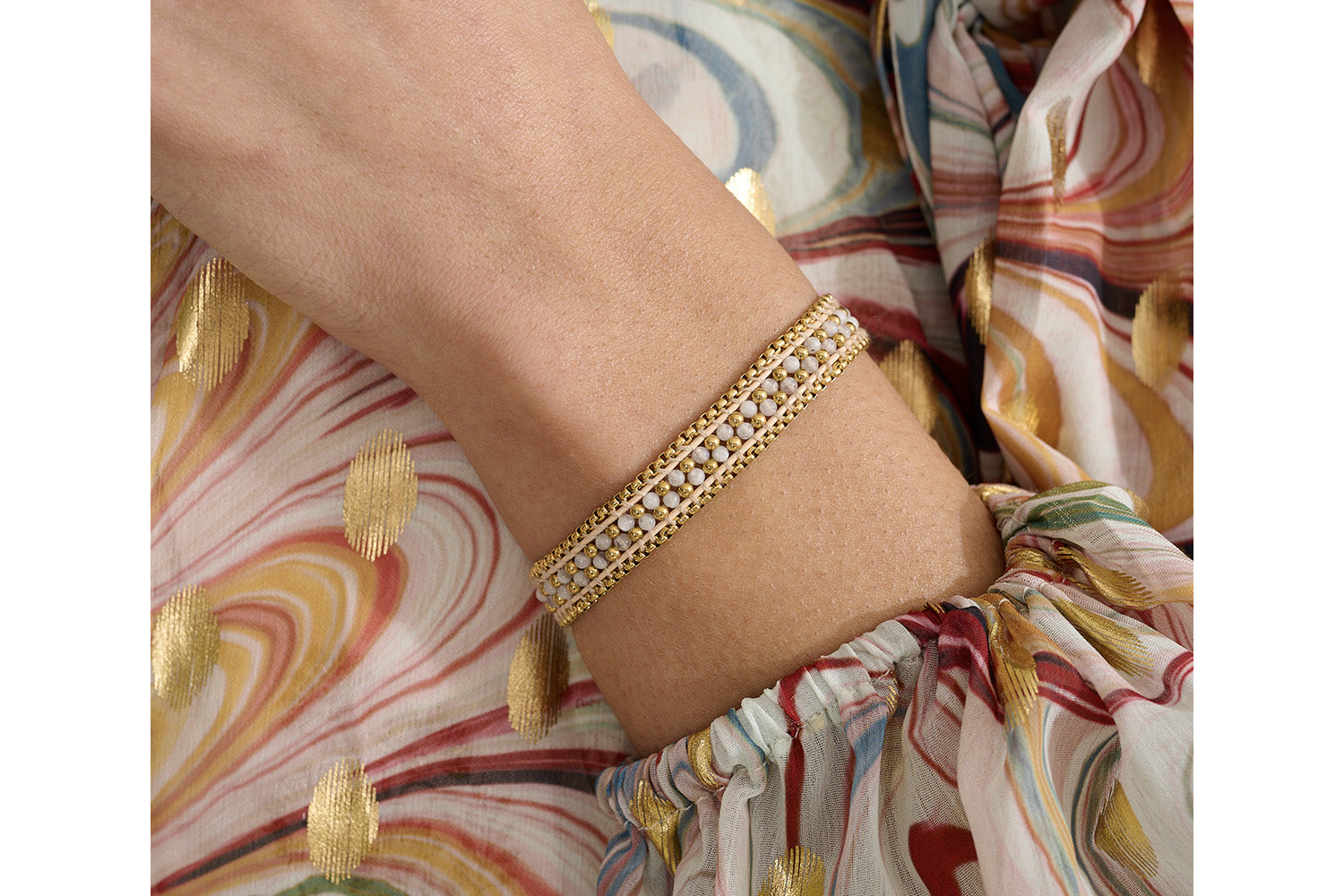 The unique Isla Rainbow Moonstone Gold bracelet can compliment any outfit this Spring Summer!