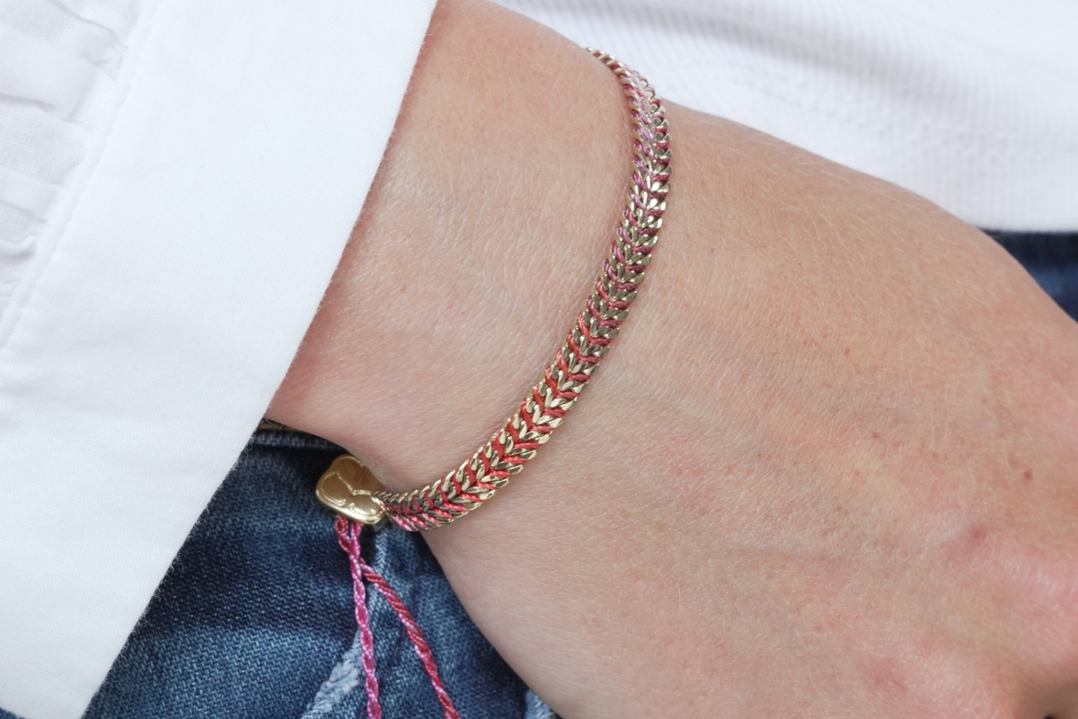 Iztac ruby skies braided bracelet featured on wrist with Boho Betty stacking bracelets