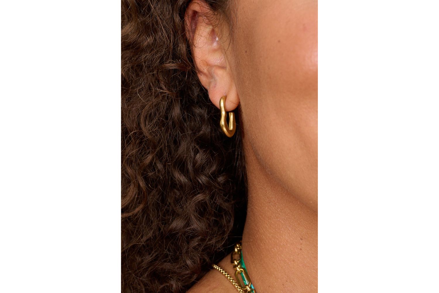 Savina earrings shown on the model as part of the Boho Betty jewellery set