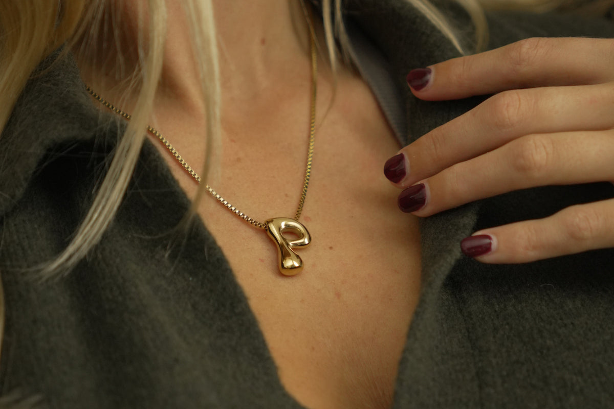 Sola waterproof gold initial letter P necklace by Boho Betty – a gold bubble letter P initial necklace on a fine box chain