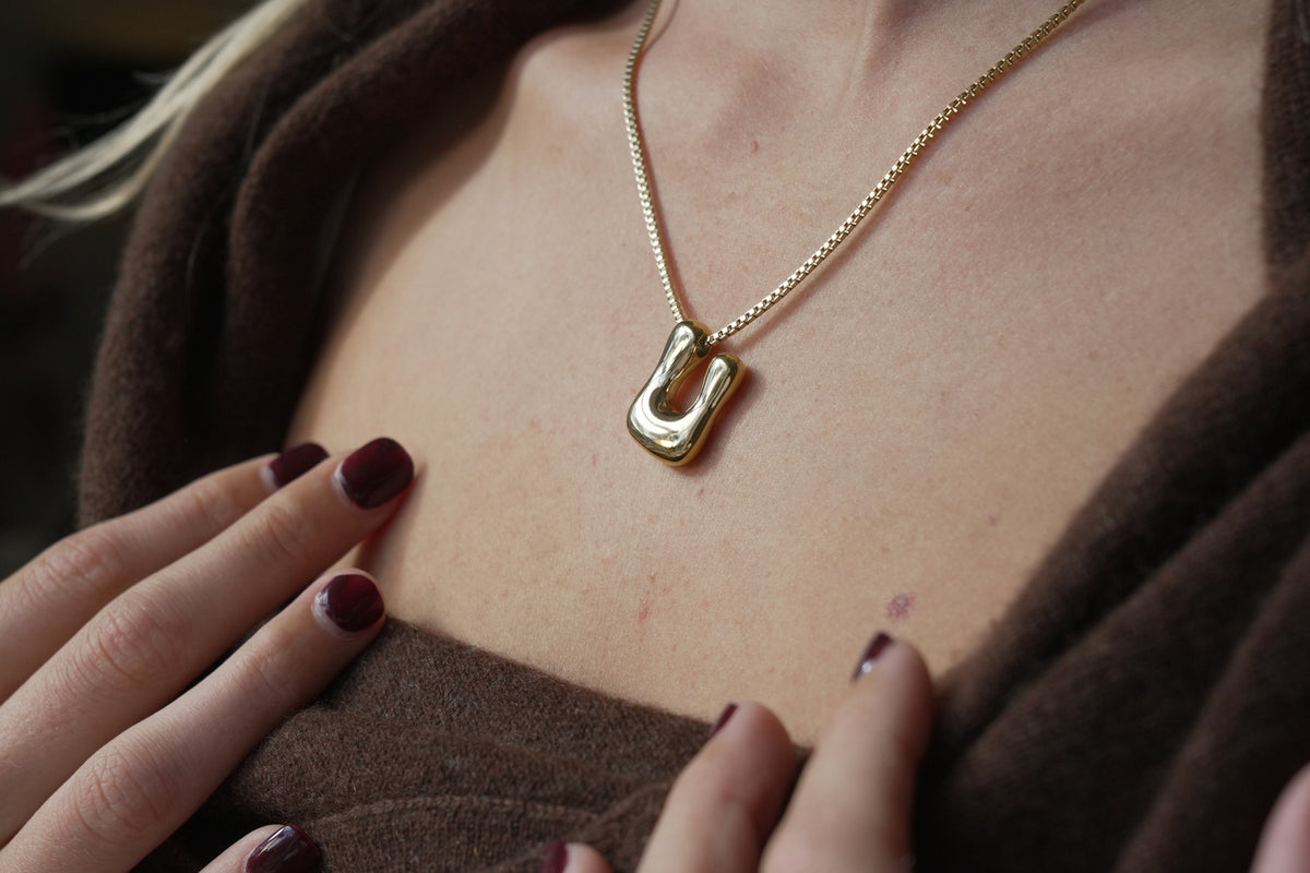 Sola waterproof gold initial letter U necklace by Boho Betty – a chunky gold letter U pendant, personalised initial jewellery