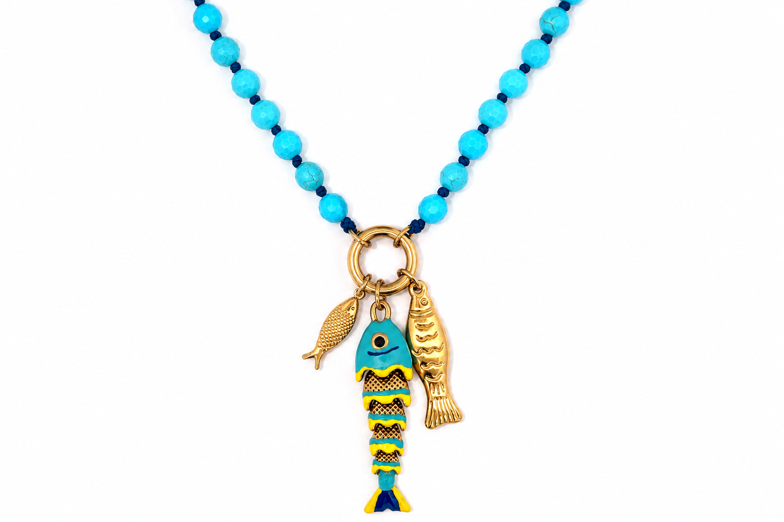 Ariel Turquoise Howlite Gold Waterproof Fish Charm Necklace featuring faceted Turquoise Howlite gemstones, three removable fish charms and waterproof 14k Gold PVD-coated stainless steel details.