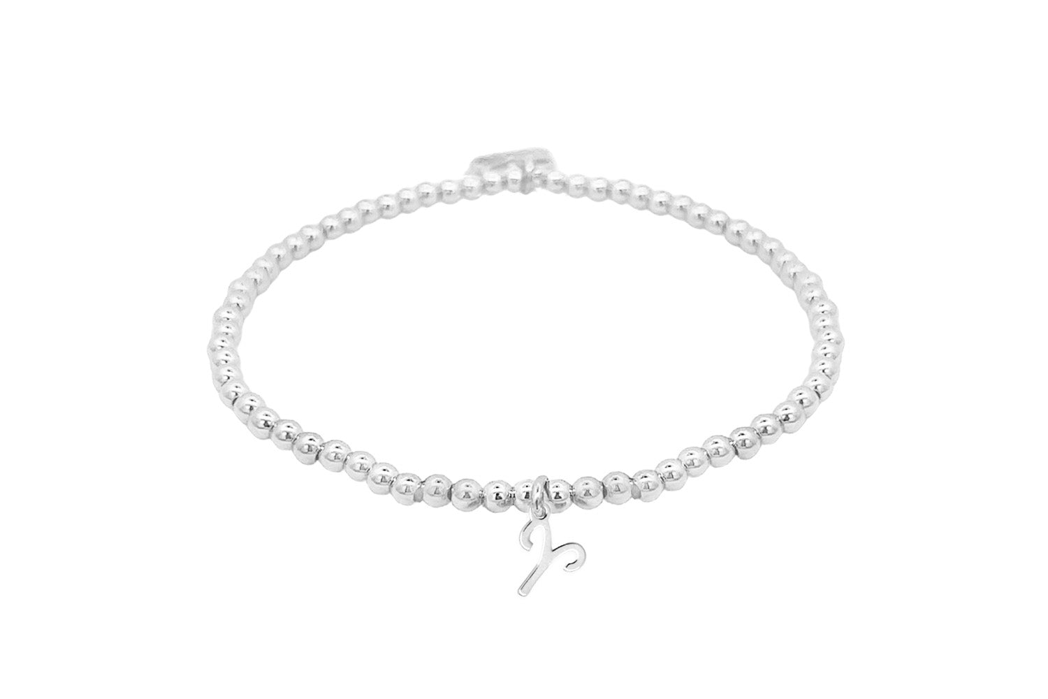 Silver stretch bead bracelet featuring a polished Aries zodiac charm and Boho Betty signature tag, designed for astrology lovers.