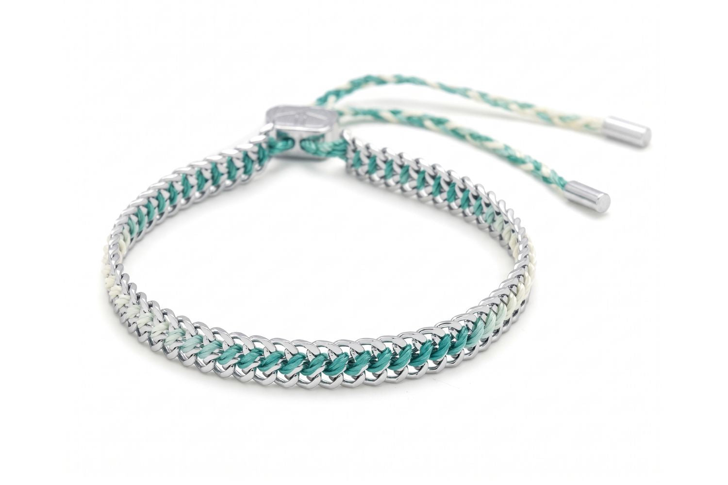 Athena Silver & Turquoise Braided Bracelet featuring vibrant turquoise and aqua woven threads braided through a waterproof silver PVD stainless steel chain with adjustable slider fastening.