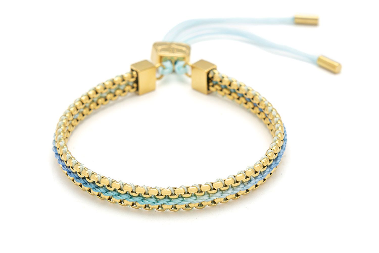 Bloom sky blue braided friendship bracelet with soft blue threads and gold chain detailing with adjustable slider fastening.