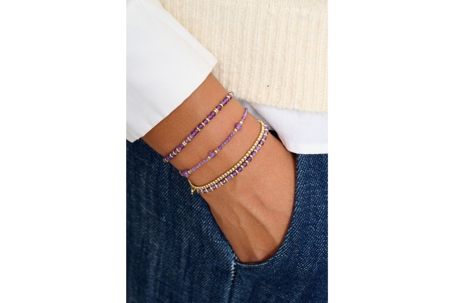Bluebell Gold & Amethyst Stretch Bracelet styled with other Boho Betty favourites on the wrist, radiating layered, soulful charm with a touch of golden light.