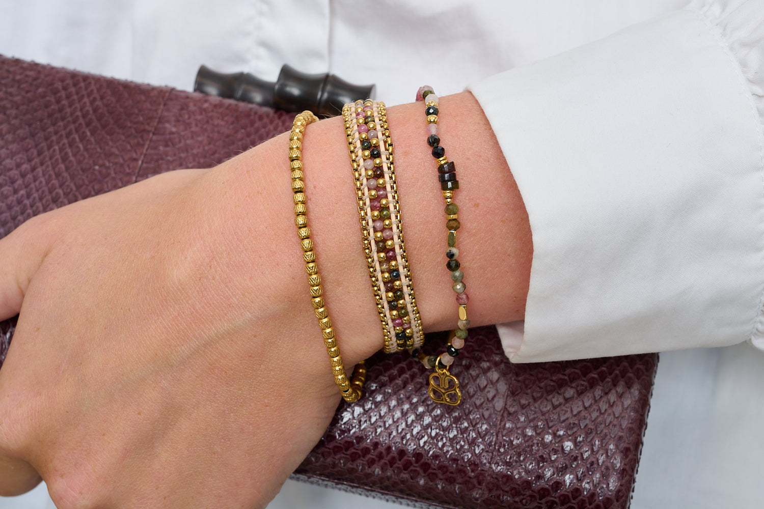 Brava Tourmaline & Gold Bracelet Stack featured on wrist with Boho Betty stacking bracelets