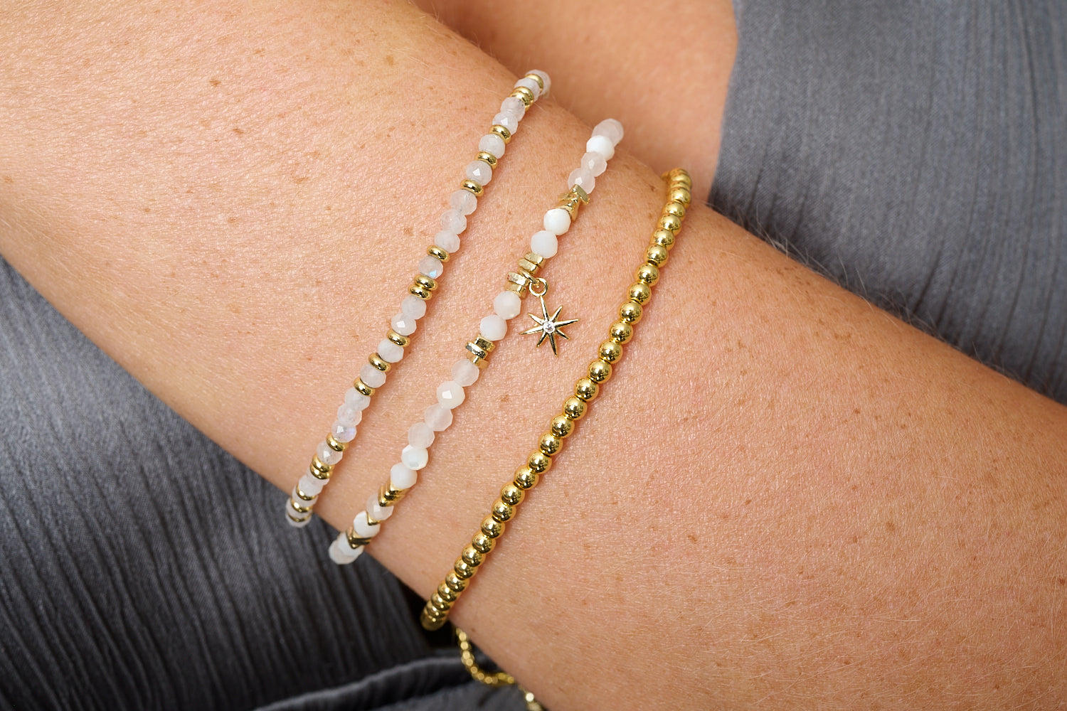 Cacata Rainbow Moonstone & Gold Stacking Bracelets, soft white and gold gemstone trio with moonstone and mother of pearl.