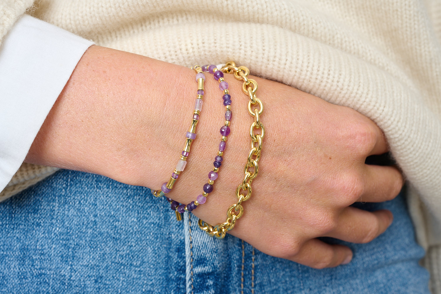 Chiara Gold & Amethyst Bead Slider Bracelet styled with soft purple gemstones and golden accents in a layered boho bracelet stack.