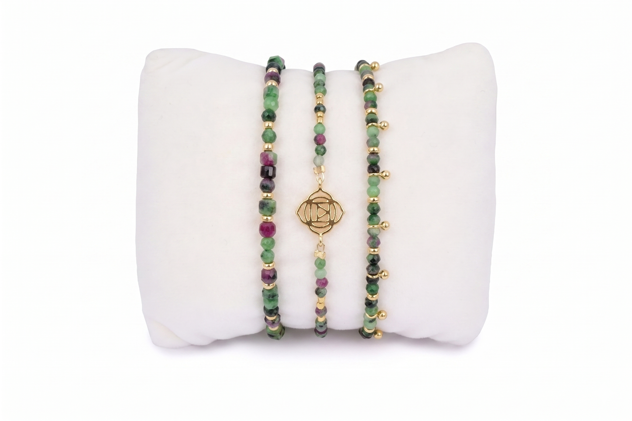 Coiba Gold & Ruby Zoisite Bracelet Stack with Violet cube-cut ruby zoisite stretch, Root Chakra strand with gold Muladhara charm, and Harmony slider with golden aura beads