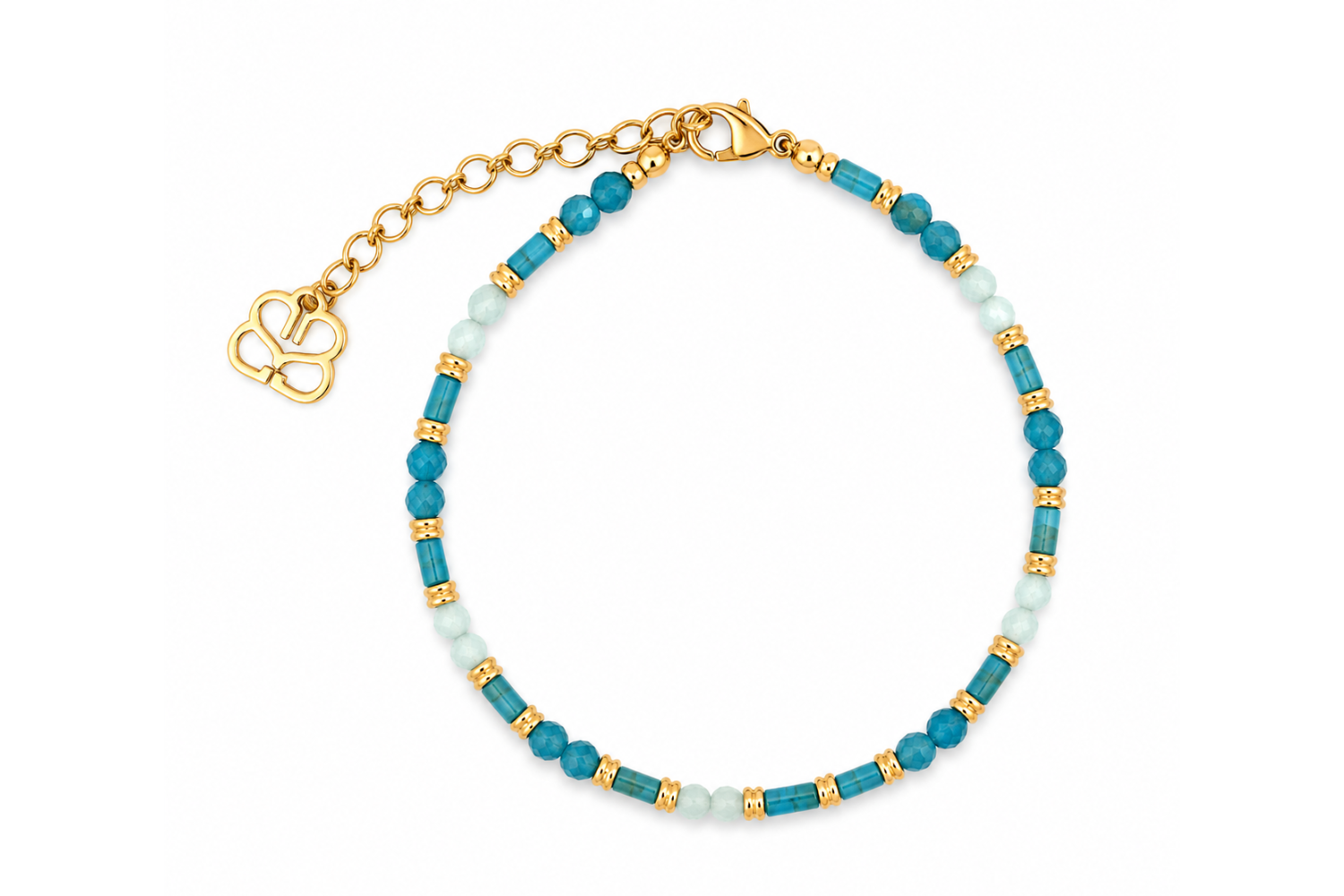 Coralie Apatite & Aquamarine Gold Anklet featuring faceted apatite and aquamarine gemstones with polished gold details on a waterproof 14k Gold PVD stainless steel chain.