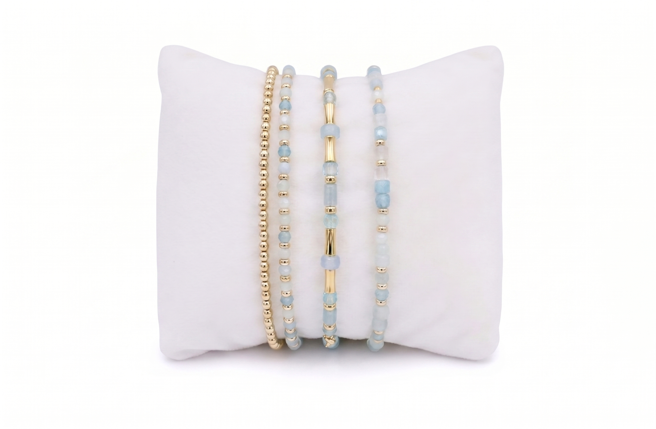 Delgadito Aquamarine & Gold Stacking Bracelets, aquamarine and gold beaded trio with slider and stretch fit.