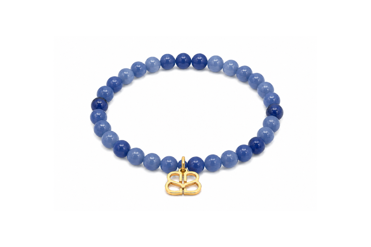 Mani Gold Blue Aventurine Bead Bracelet featuring smooth Blue Aventurine gemstone beads, a signature Boho Betty filigree charm and waterproof 14k Gold PVD stainless steel details.