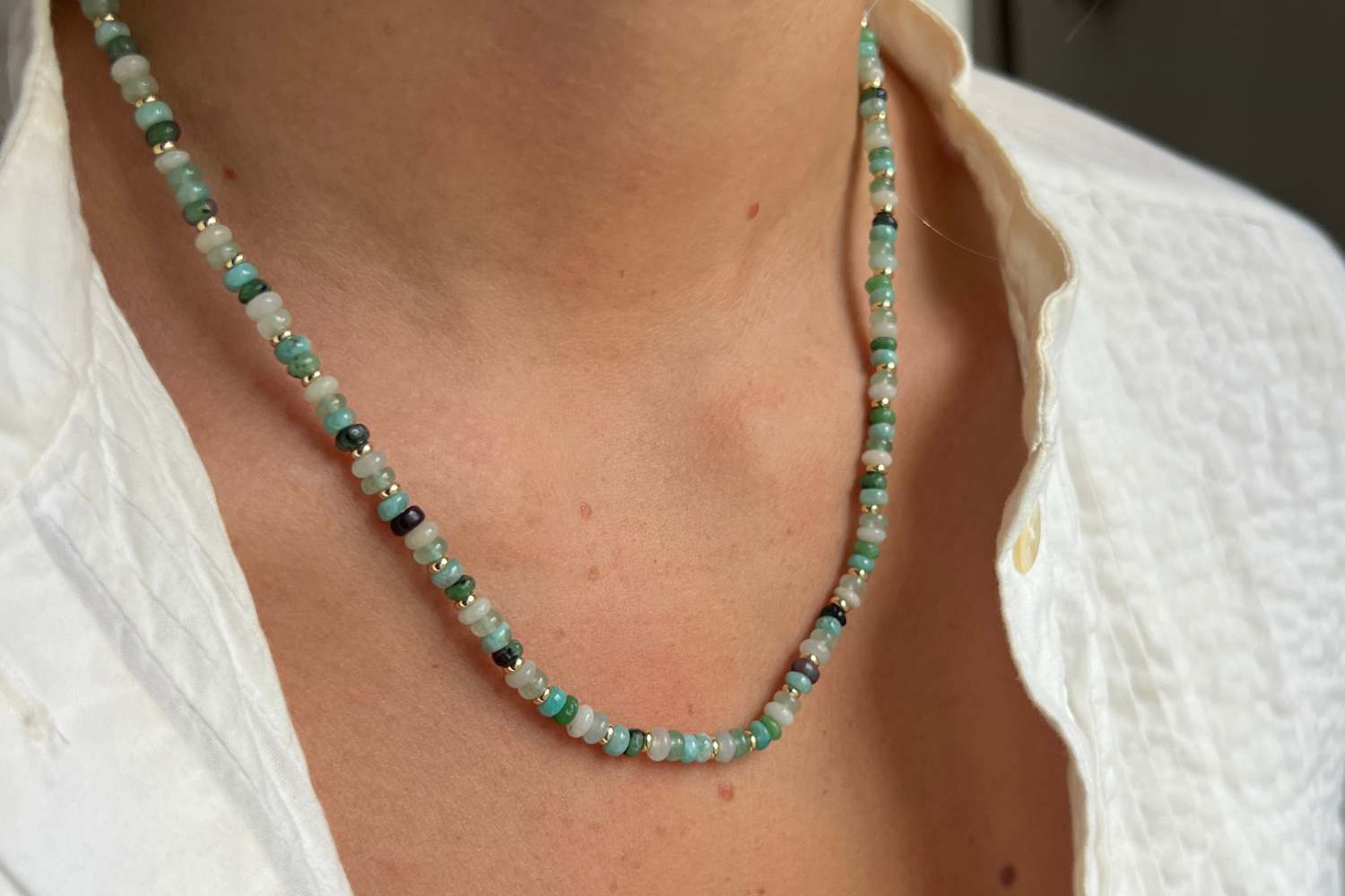 Emma Gold & Amazonite Mix Gemstone Beaded Necklace styled for everyday chic and statement occasions, showcasing vibrant green and white gemstone beads with shimmering gold accents.