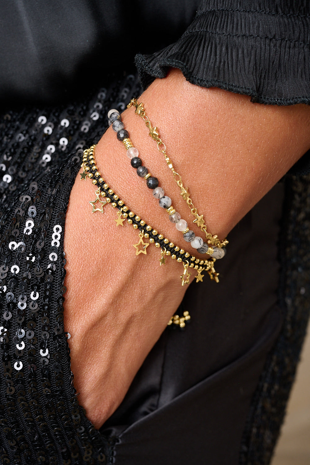Black and gold bracelet styled with Boho Betty moto boho jewellery