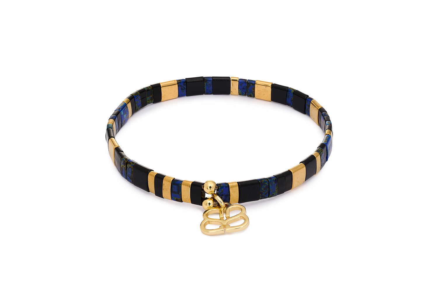 Fantasy Gold & Navy Tila Bracelet with striped navy, black, and gold Japanese beads in a stretch-fit design, finished with Boho Betty charm.