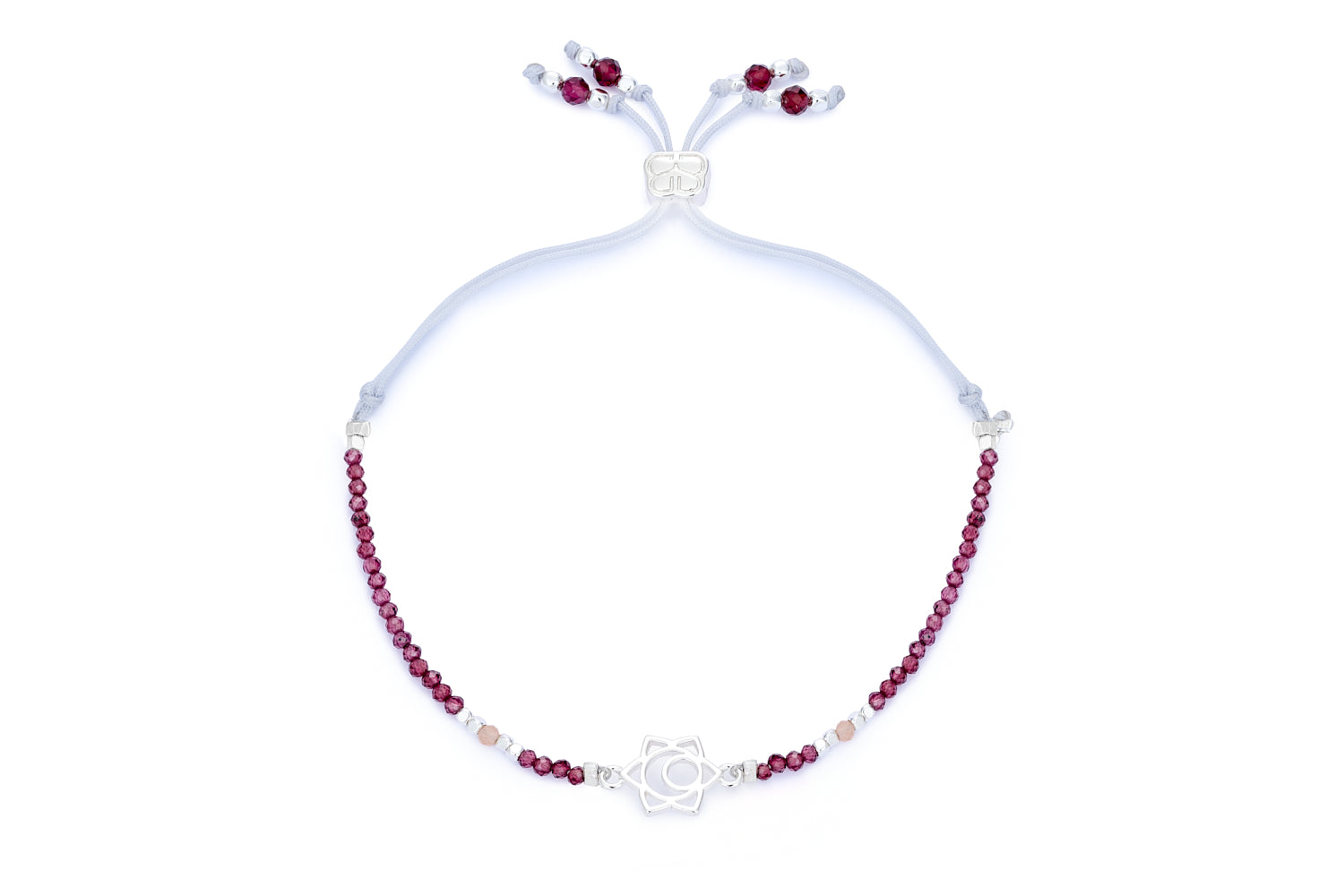 Garnet & Sunstone Silver Sacral Chakra Bracelet featuring red garnet, golden sunstone, and a silver-plated chakra charm with an adjustable thread slider.