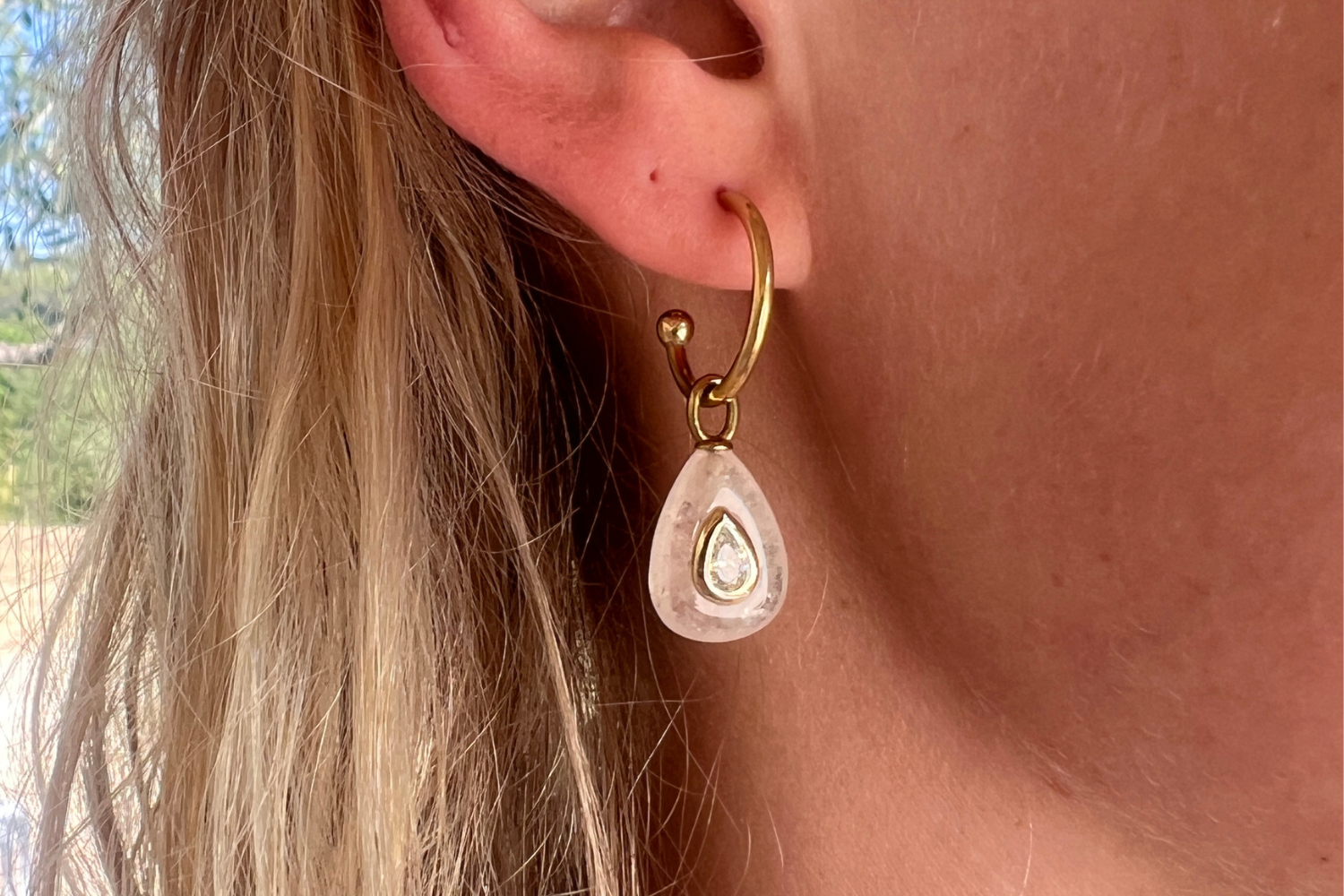 Hana Clear Quartz Gold Hoop Earrings worn with natural clear quartz gemstone drops and waterproof 14k gold PVD hoops for effortless everyday styling.