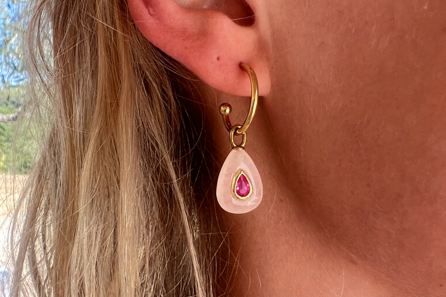 Hana Rose Quartz Gold Hoop Earrings worn with Rose Quartz gemstone drops and ruby-coloured crystal details on waterproof 14k gold PVD hoops for effortless holiday styling.