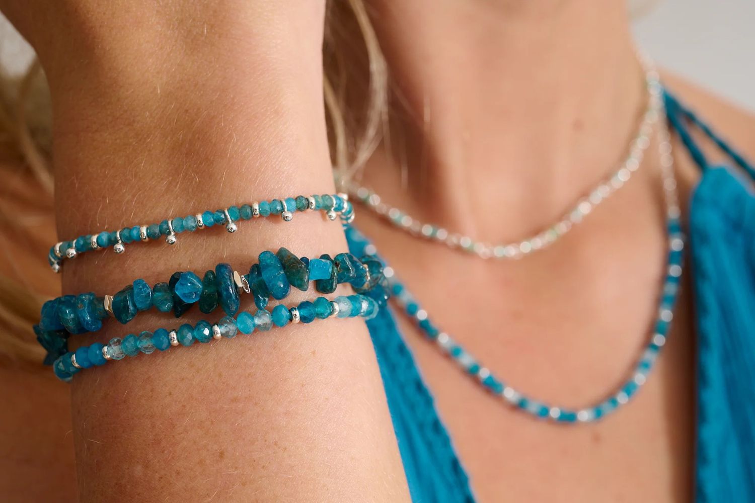 Harmony Apatite Silver Bracelet styled in a relaxed stack with ocean-inspired tones for a peaceful, boho-chic look.