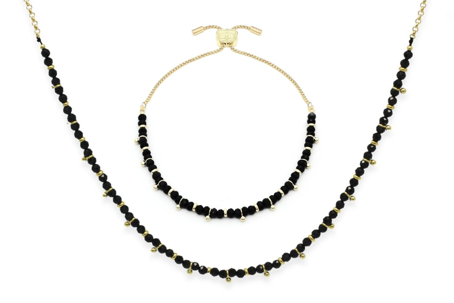 Harmony Black Spinel Necklace and Bracelet Set featuring polished black spinel gemstones and 12k gold-plated accents, designed for elegance and empowerment.