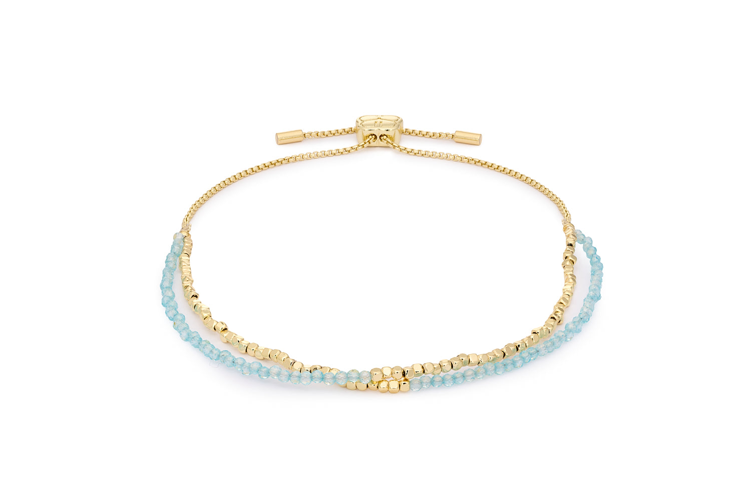 Juniper Gold & Blue Topaz Double Strand Bracelet featuring faceted blue topaz gemstones with 12k gold-plated brass accents and adjustable slider fit up to 26cm.