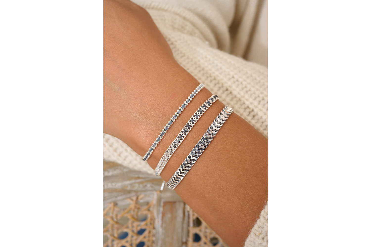Lilia charcoal and silver bracelet featured on wrist with Boho Betty stacking bracelets