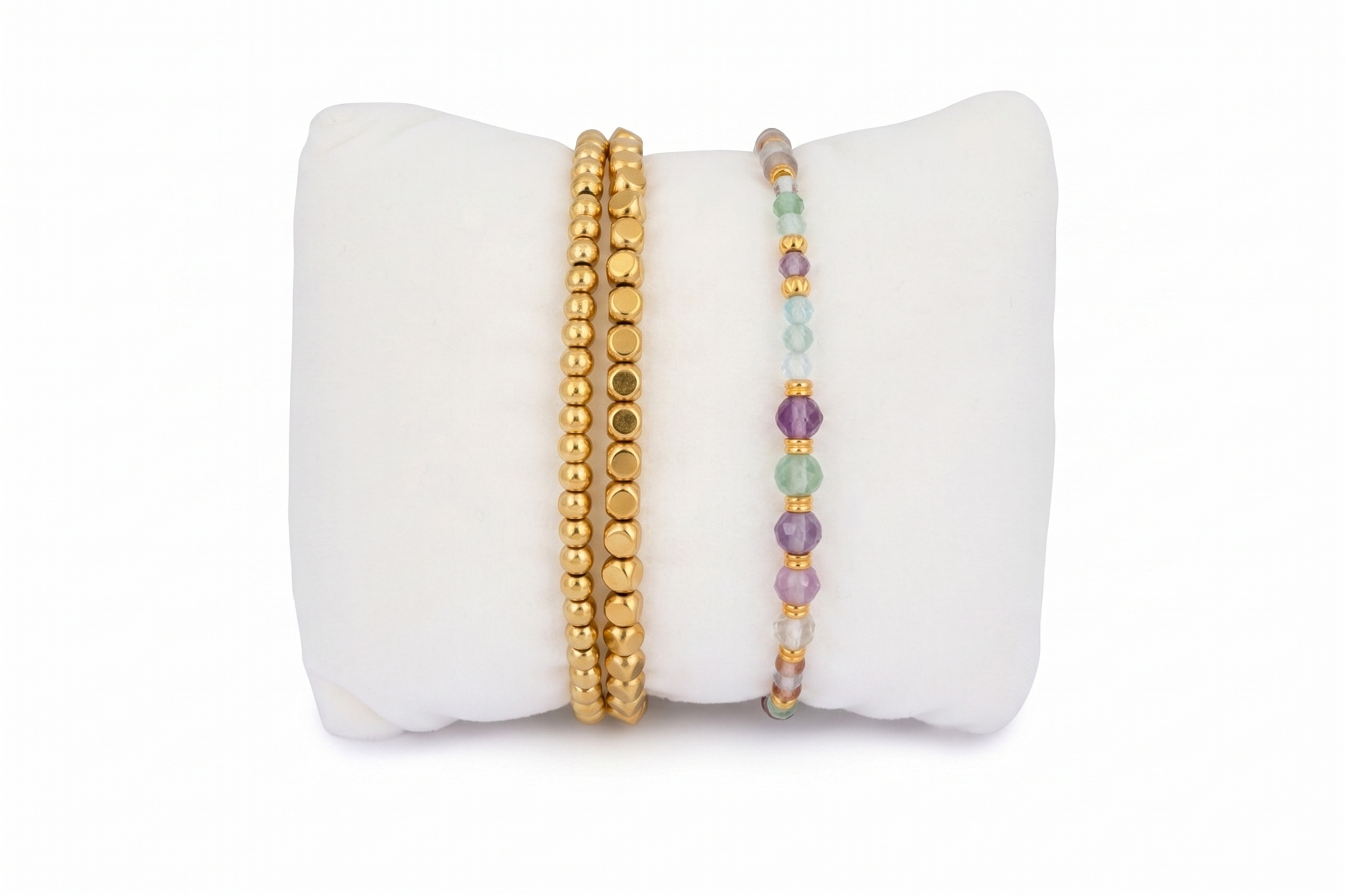 Makena Rainbow Fluorite & Gold Bracelet Stack featuring pastel rainbow fluorite gemstones and layered gold stretch bead bracelets with polished gold details.
