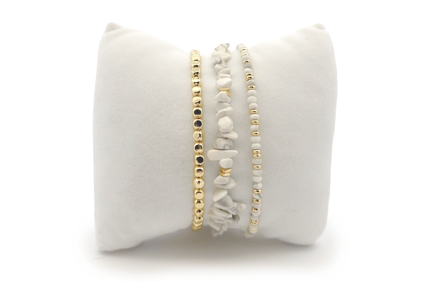 Malolo White Howlite Gold Bracelet Stack featuring smooth white howlite beads and 12k gold-plated accents, perfect for a serene, luxurious look.