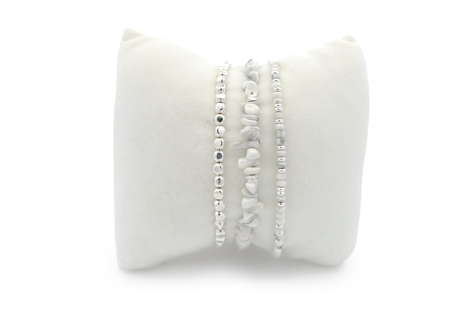 Malolo White Howlite Silver Stacking Bracelet featuring smooth white howlite beads and silver accents, designed for a calming and chic look.