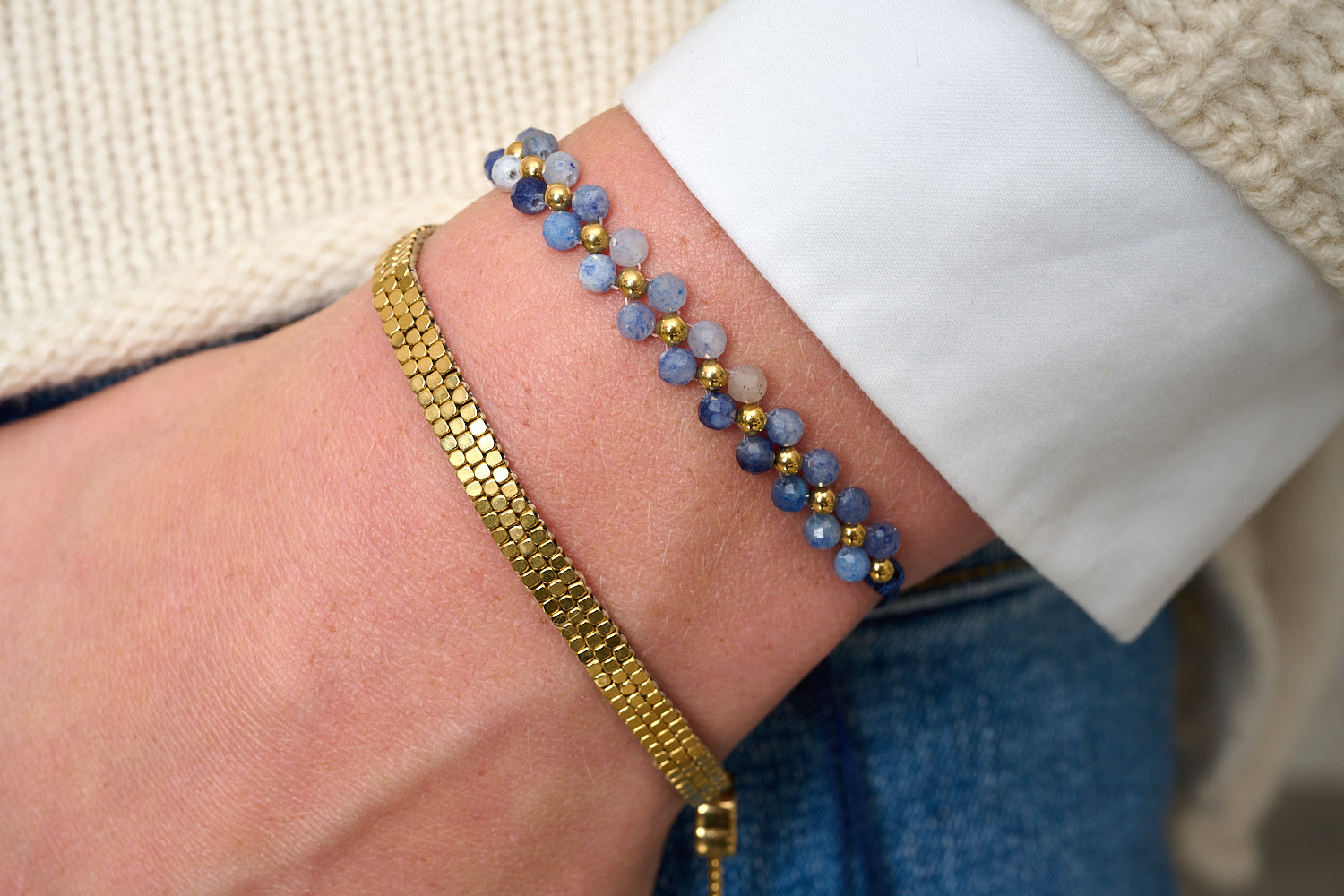 Marisol Gold & Blue Aventurine Gemstone Bracelet featured on wrist with Boho Betty stacking bracelets in gold and blue gemstone tones.