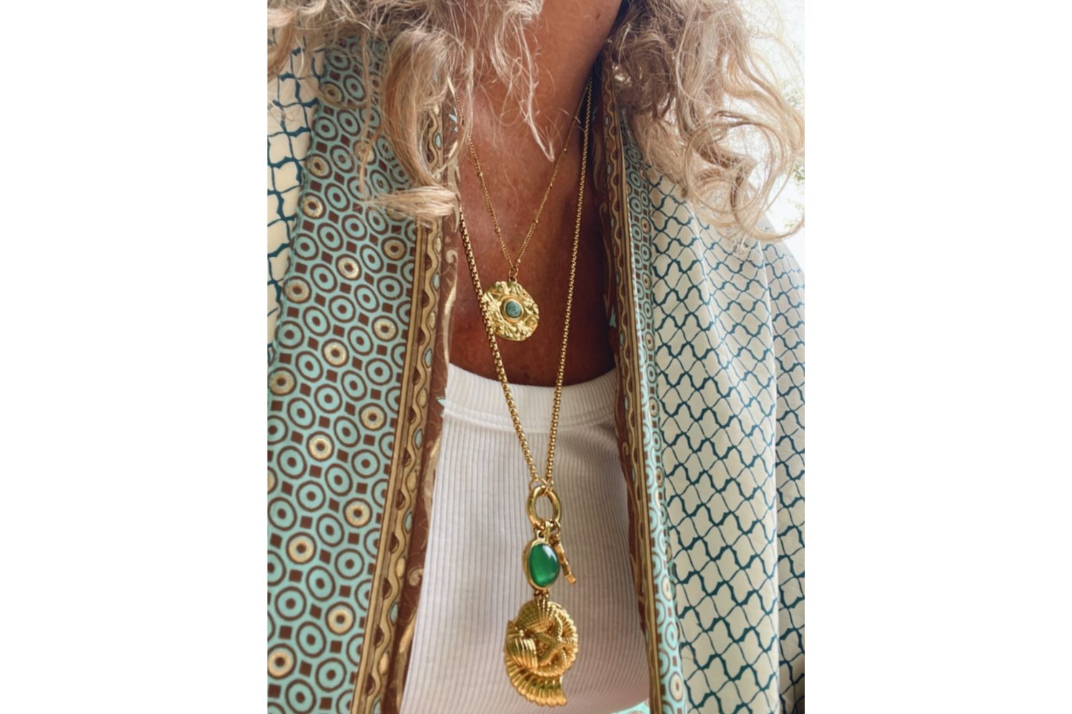 Pair the Nerissa Turquoise Howlite Gold with the statement Hemani in Green Agate Gold to complete your summer look.
