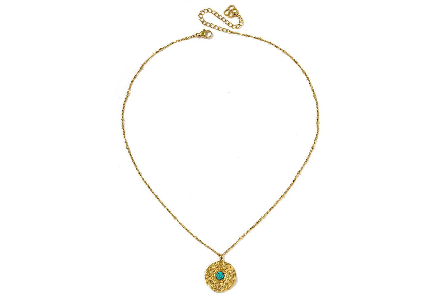 Full length view of the Nerissa Turquoise Howlite Gold Amulet Necklace on a beaded gold satellite chain.