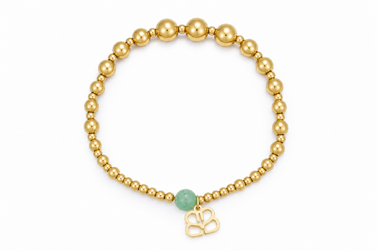 Noa waterproof gold bead stretch bracelet by Boho Betty – polished gold beads with a single amazonite stone and logo charm, 18cm stretch fit, stackable and waterproof