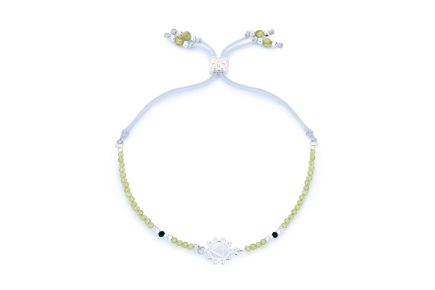 Peridot & Malachite Silver Solar Plexus Chakra Bracelet featuring vibrant peridot and malachite beads, a sterling silver-plated chakra charm, and adjustable slider fastening.