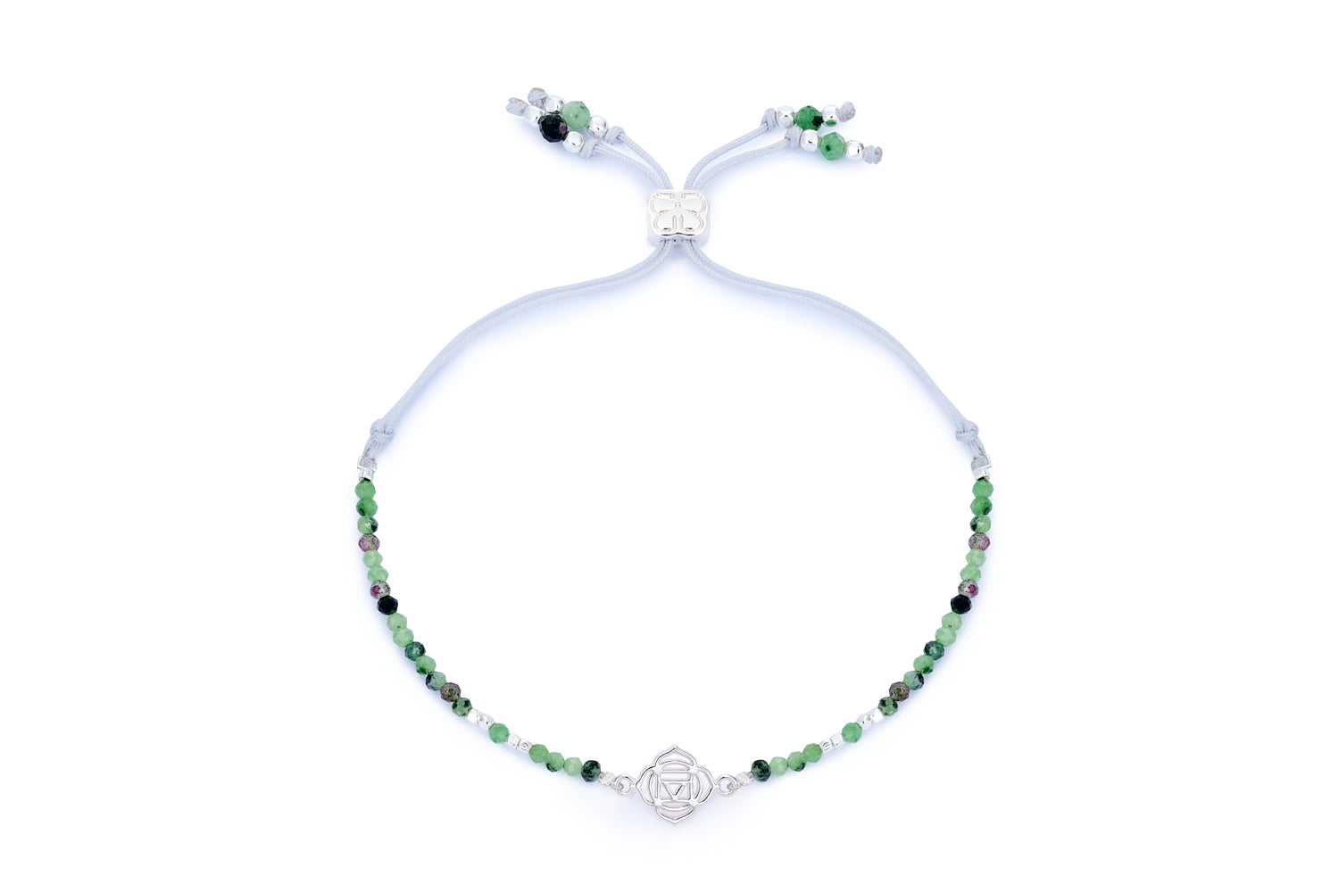 Ruby Zoisite & Silver Root Chakra Bracelet featuring vibrant green and deep ruby gemstone beads, a sterling silver-plated chakra charm, and an adjustable slider fastening for a comfortable, custom fit.