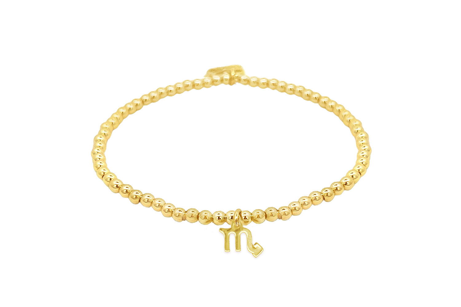 Gold stretch bead bracelet featuring a polished Scorpio zodiac charm and Boho Betty signature tag, designed for astrology lovers.