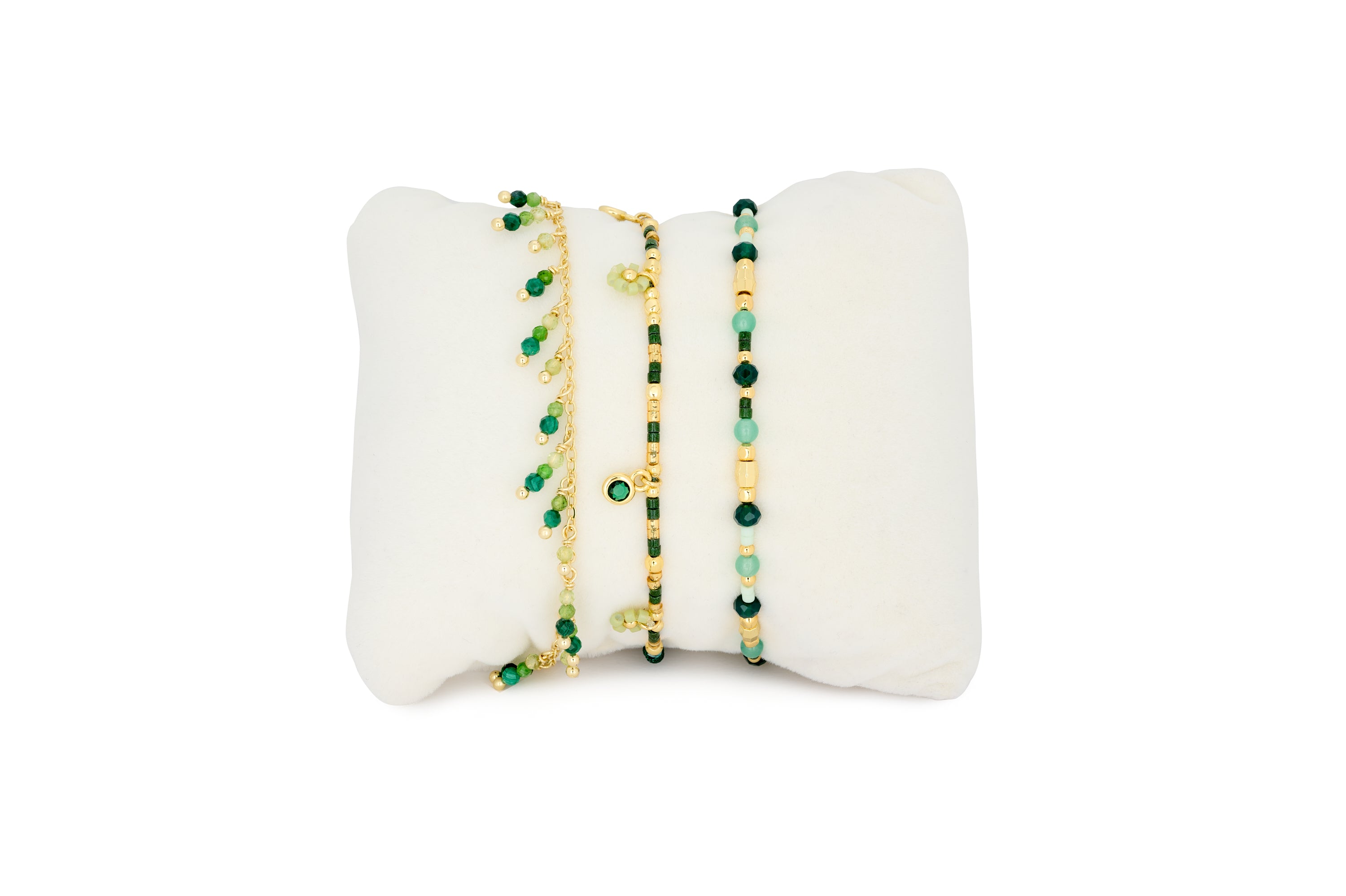 Silba Malachite and Gold Bracelet Stack featuring layered green gemstone bracelets, gold chain textures and beaded boho-inspired details.