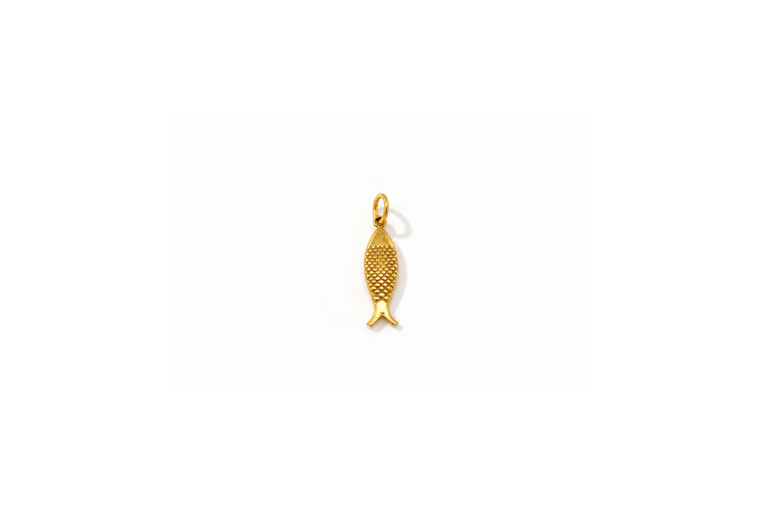 Small Gold Fish Charm featuring a polished fish design in waterproof 14k Gold PVD stainless steel for Boho Betty charm carrier necklaces and bracelets.