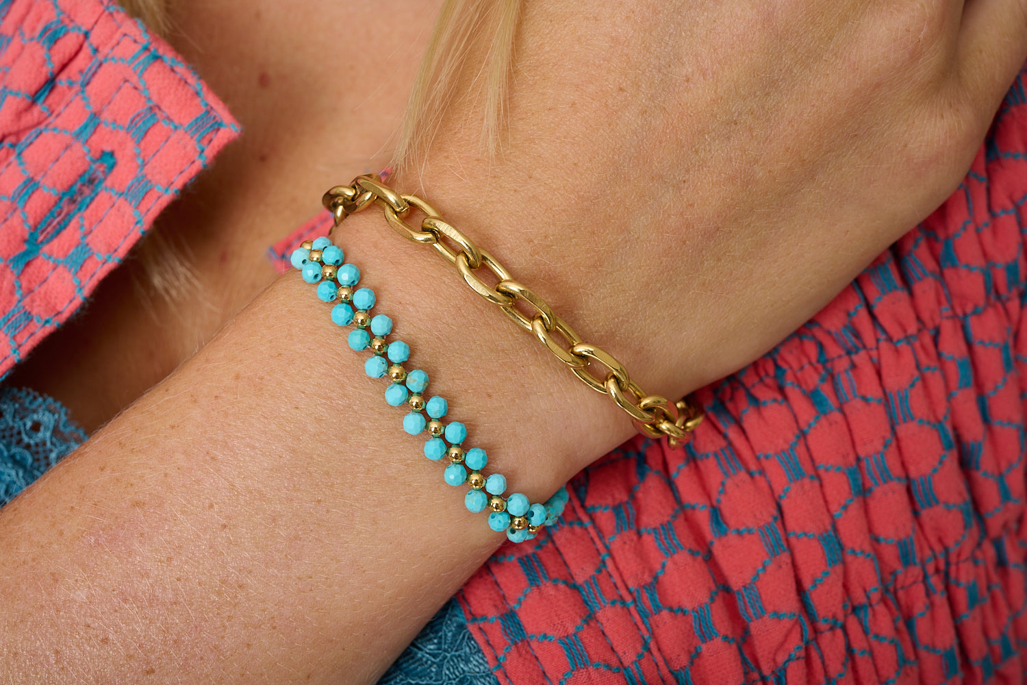 Tanna Turquoise Gold Bracelet Stack, chunky gold chain bracelet styled with a turquoise beaded friendship bracelet on the wrist.