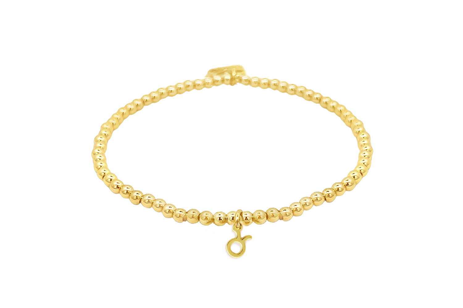 Gold stretch bead bracelet featuring a polished Taurus zodiac charm and Boho Betty signature tag, designed for astrology lovers.