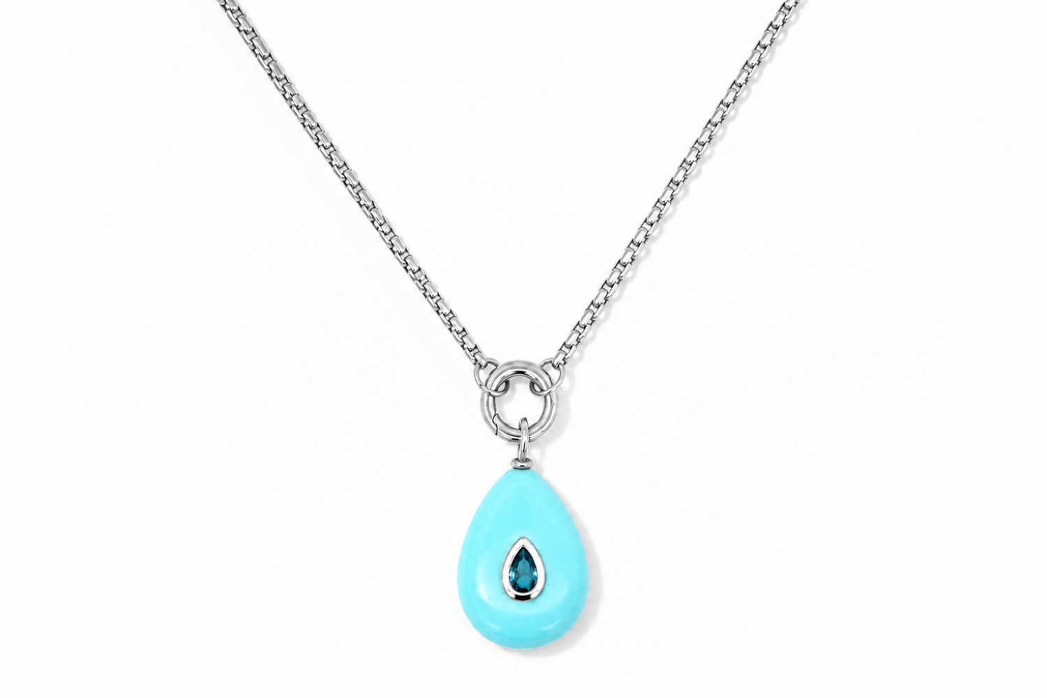 Thalia Long Turquoise Howlite Teardrop Pendant Necklace featuring a turquoise howlite gemstone with a blue crystal on a waterproof stainless steel chain.