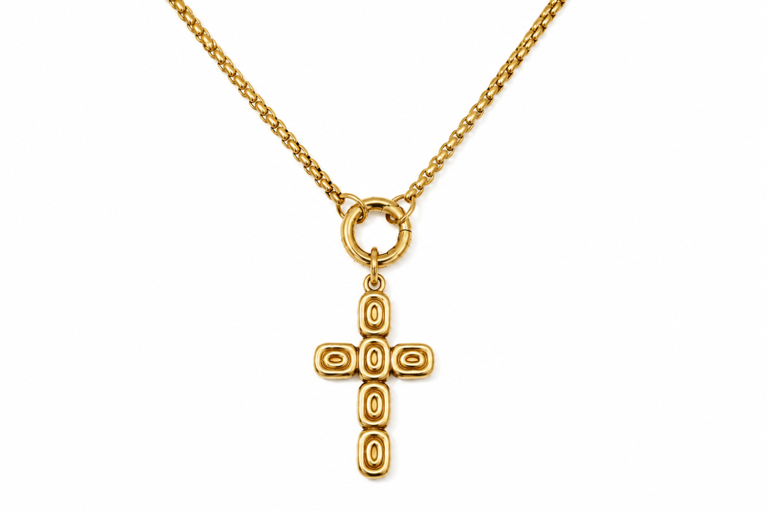 Thalia Short Gold Cross Necklace featuring a sculptural gold cross pendant on a waterproof 14k gold PVD stainless steel chain.