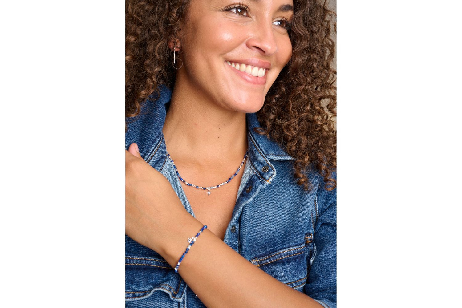 Yolanda & Una Kyanite Silver Jewellery Set styled with denim jacket featuring necklace and bracelet stack